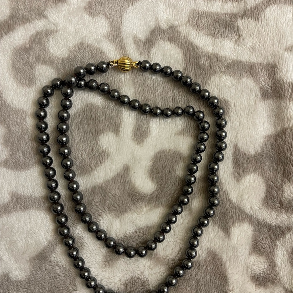 Elegant Black Bead Necklace with 18K Gold Clasp
